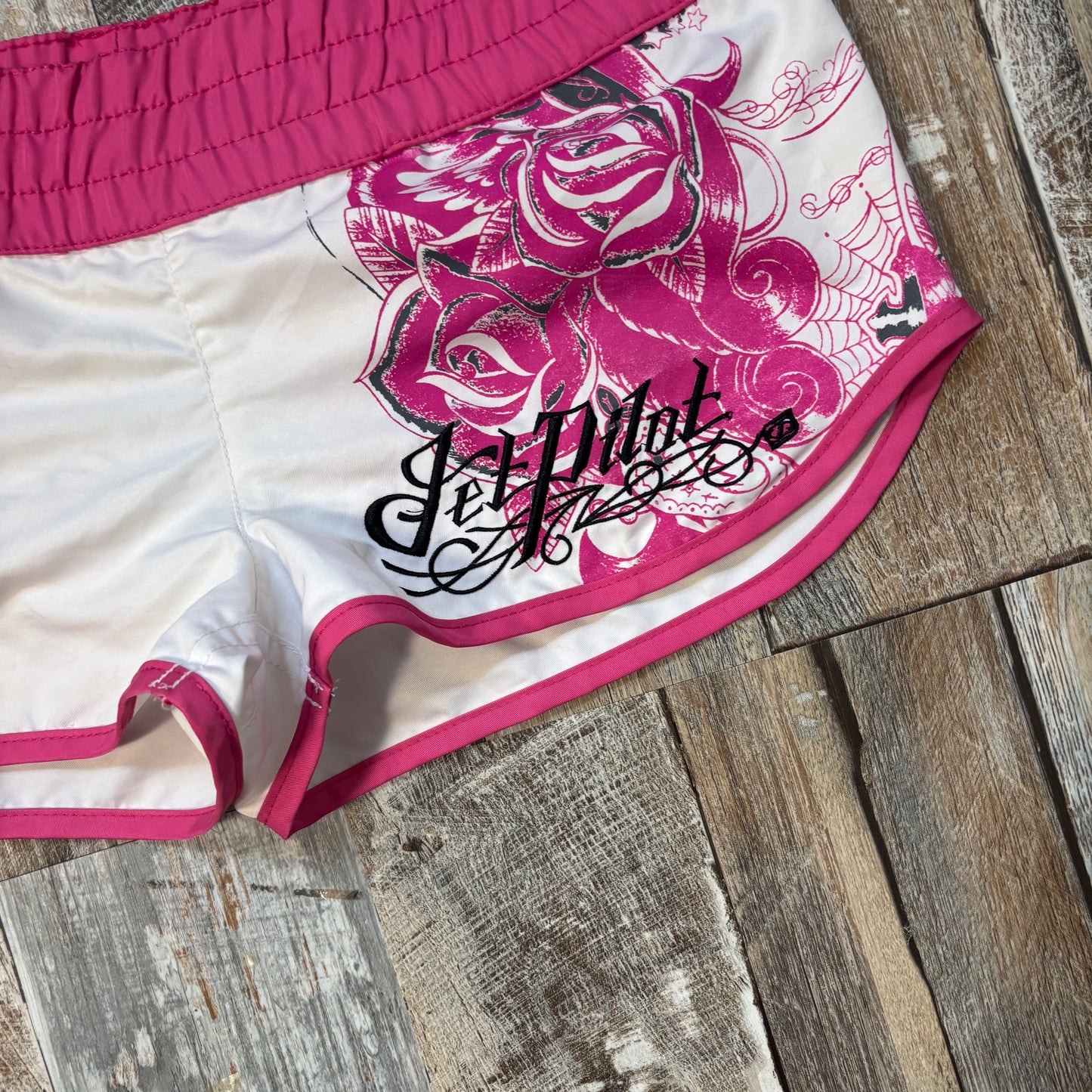 mini board shorts pink white jet pilot floral size 8