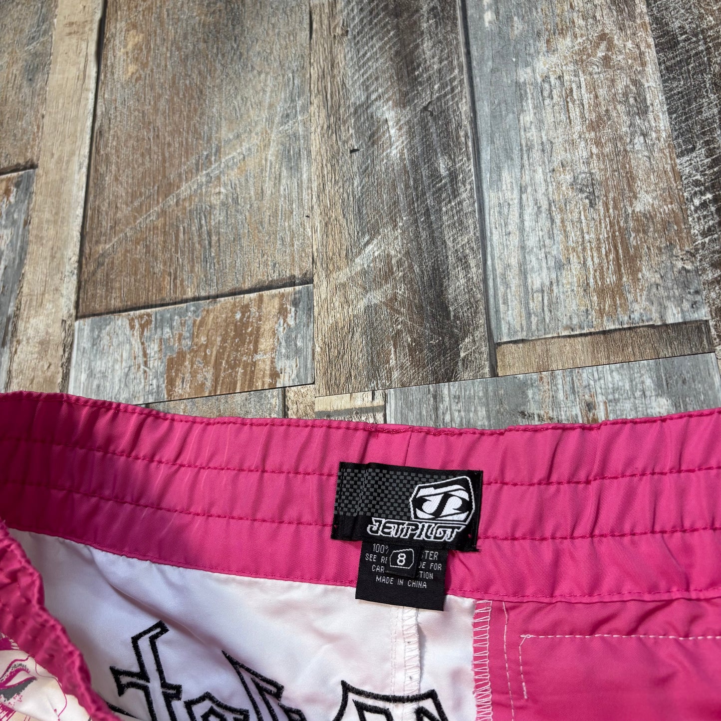 mini board shorts pink white jet pilot floral size 8